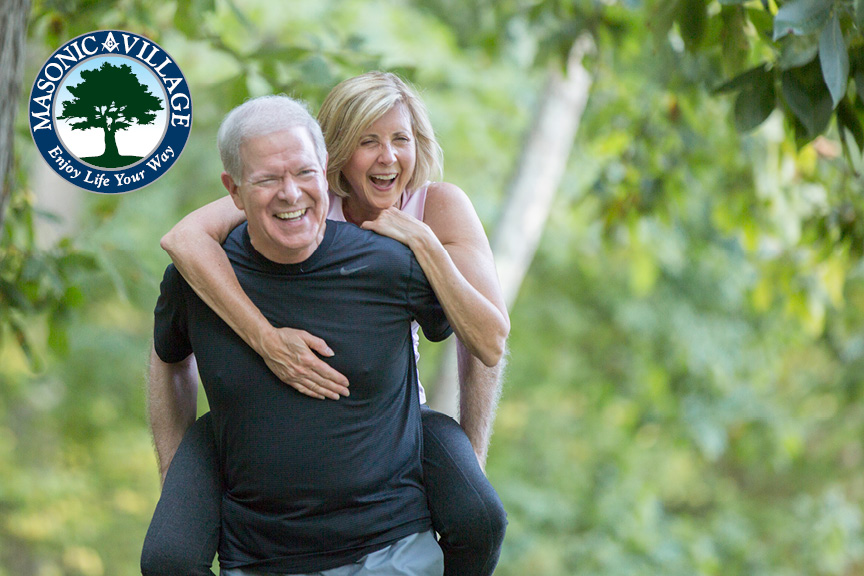 Active elderly couple together on outdoor trails